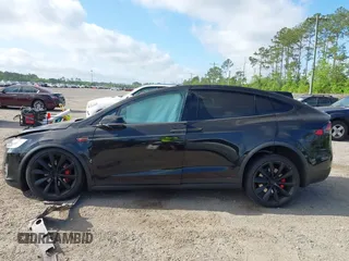 2016 Tesla Model X 70D z VIN 5YJXCAE29GF003478, wystawiony jako IAAI lot #41965737 z przebiegiem 105 930 mil mil oraz . Historia ofert i sprzedaży dostępna na DreamBid. Obrazek 14.