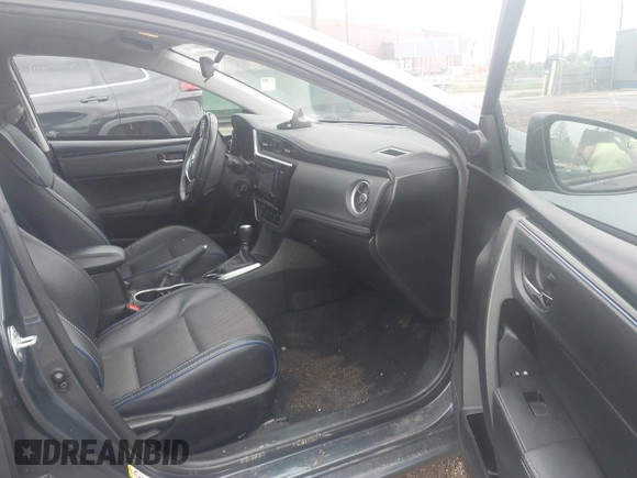2017 Toyota Corolla L z VIN 5YFBURHE7HP633484, wystawiony jako IAAI lot #42538243 z przebiegiem 80 492 mil mil oraz . Historia ofert i sprzedaży dostępna na DreamBid. Obrazek 5.