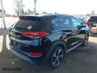 2017 Hyundai Tucson Value with VIN KM8J33A28HU484898, listed as a IAAI auction lot 41847105 with 53,210 mi miles. Bid and sale history available at carsss.com. Image 4.