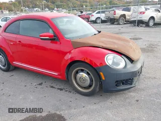 2012 Volkswagen Beetle 2.5L PZEV with VIN 3VWJP7AT0CM641164, listed as a IAAI auction lot 40698387 with 113,200 mi miles. Bid and sale history available at carsss.com. Image 13.