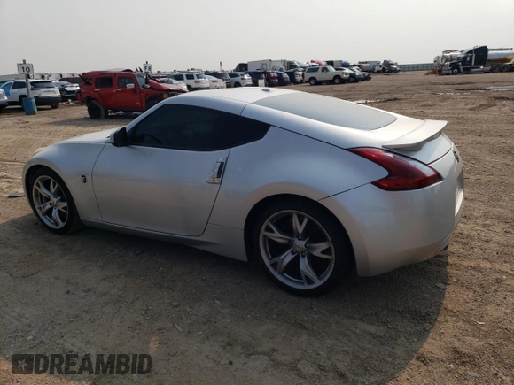 2012 Nissan 370Z Touring with VIN JN1AZ4EH4CM560751, listed as a Copart auction lot 64516764 with 81,689 mi miles and Salvage Title. Bid and sale history available at carsss.com. Image 2.