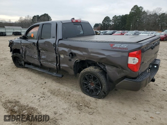 2021 Toyota Tundra SR with VIN 5TFUY5F18MX012725, listed as a Copart auction lot 52550205 with 54,727 mi miles and Salvage title. Bid and sale history available at DreamBid. Image 2.