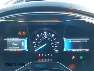 2018 Ford Fusion SE z VIN 3FA6P0LU4JR269064, wystawiony jako IAAI lot #41222967 z przebiegiem 115 077 mil mil oraz . Historia ofert i sprzedaży dostępna na DreamBid. Obrazek 7.