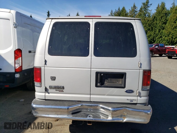 2008 Ford Econoline Passenger XL with VIN 1FBNE31L08DA43554, listed as a Copart auction lot 73714354 with 205,979 mi miles and Salvage Title. Bid and sale history available at DreamBid. Image 6.