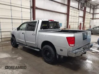 2004 Nissan Titan LE with VIN 1N6AA07B44N512889, listed as a IAAI auction lot 41569019 with 154,655 mi miles. Bid and sale history available at carsss.com. Image 3.