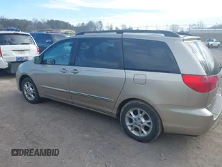 2006 Toyota Sienna XLE with VIN 5TDZA22C16S571350, listed as a IAAI auction lot 41725551 with 233,487 mi miles. Bid and sale history available at carsss.com. Image 6.