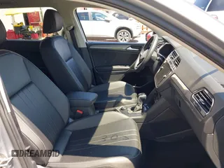 2024 Volkswagen Tiguan SE with VIN 3VV2B7AX6RM149564, listed as a IAAI auction lot 42686972 with 20,350 mi miles and . Bid and sale history available at DreamBid. Image 5.