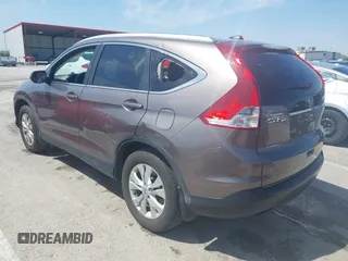 2014 Honda CR-V EX-L with VIN 5J6RM4H70EL096555, listed as a IAAI auction lot 42038062 with 113,601 mi miles. Bid and sale history available at carsss.com. Image 3.