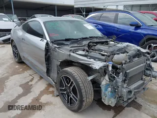 2020 Ford Mustang EcoBoost with VIN 1FA6P8TH9L5139174, listed as a IAAI auction lot 42148089 with 115,979 mi miles and . Bid and sale history available at DreamBid. Image 1.