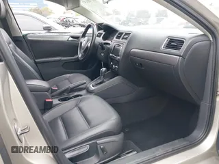 2014 Volkswagen Jetta TDI w/Premium with VIN 3VWLL7AJ3EM231190, listed as a IAAI auction lot 41722137 with 100,965 mi miles and . Bid and sale history available at DreamBid. Image 5.