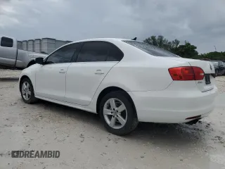 2014 Volkswagen Jetta TDI w/Premium with VIN 3VWLL7AJ2EM266867, listed as a Copart auction lot 52174475 with 73,574 mi miles and Salvage title. Bid and sale history available at DreamBid. Image 2.