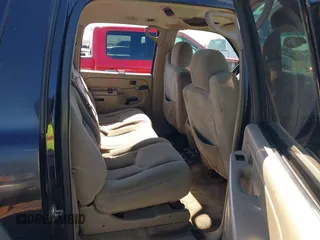 2005 Chevrolet Suburban LS z VIN 3GNEC16Z25G158598, wystawiony jako IAAI lot #41266791 z przebiegiem 237 191 mil mil oraz . Historia ofert i sprzedaży dostępna na DreamBid. Obrazek 8.