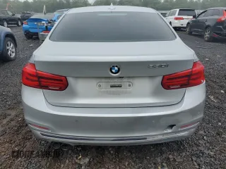 2018 BMW 3 Series 330i with VIN WBA8B9G50JNU98561, listed as a Copart auction lot 61293325 with 106,656 mi miles and Clean title. Bid and sale history available at DreamBid. Image 6.