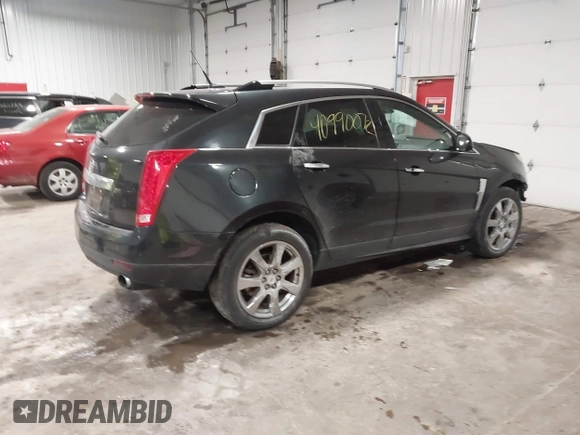 2011 Cadillac SRX Performance Collection with VIN 3GYFNEEY9BS533994, listed as a IAAI auction lot 40990072 with 168,134 mi miles. Bid and sale history available at carsss.com. Image 4.