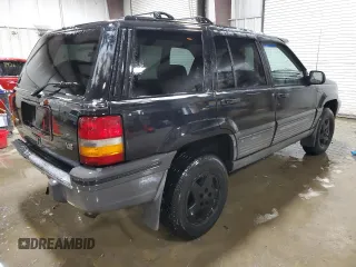 1995 Jeep Grand Cherokee Laredo with VIN 1J4GZ58Y5SC565187, listed as a Copart auction lot 45179985 with 122,863 mi miles and Salvage Title. Bid and sale history available at carsss.com. Image 3.