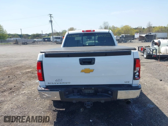 2013 Chevrolet Silverado 1500 LTZ with VIN 3GCPKTE24DG123063, listed as a IAAI auction lot 42061675 with 221,813 mi miles and . Bid and sale history available at DreamBid. Image 16.