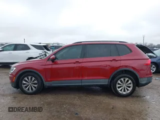 2018 Volkswagen Tiguan S with VIN 3VV1B7AX8JM124827, listed as a IAAI auction lot 41544321 with 101,492 mi miles and . Bid and sale history available at DreamBid. Image 14.