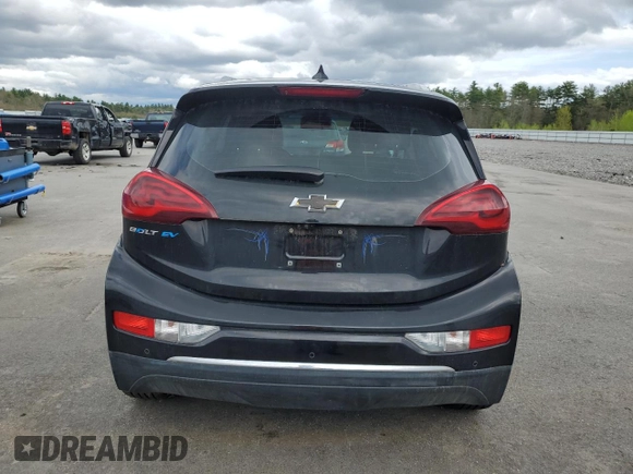 2018 Chevrolet Bolt EV Premier with VIN 1G1FX6S09J4122445, listed as a Copart auction lot 55230635 with 33,569 mi miles and Salvage title. Bid and sale history available at DreamBid. Image 6.