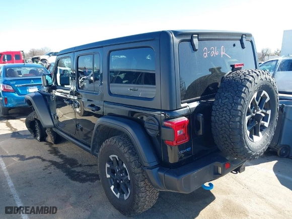 2024 Jeep Wrangler 4xe Rubicon with VIN 1C4RJXR65RW241101, listed as a IAAI auction lot 41778044 with 32,041 mi miles. Bid and sale history available at carsss.com. Image 3.