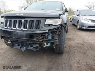 2014 Jeep Grand Cherokee Overland with VIN 1C4RJFCG6EC121654, listed as a IAAI auction lot 42051730 with 163,853 mi miles. Bid and sale history available at carsss.com. Image 17.
