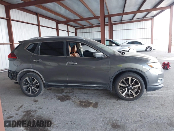 2018 Nissan Rogue SV with VIN JN8AT2MT9JW485804, listed as a IAAI auction lot 41711723 with 74,860 mi miles and . Bid and sale history available at carsss.com. Image 14.