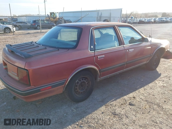 1990 Oldsmobile Cutlass Ciera with VIN 2G3AM54N7L2303078, listed as a IAAI auction lot 41882943 with 190,496 mi miles and . Bid and sale history available at DreamBid. Image 4.