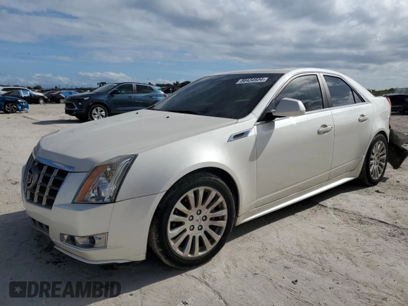 2012 Cadillac CTS Performance with VIN 1G6DJ5E3XC0157881, listed as a Copart auction lot 86434934 with 60,943 mi miles and Salvage Title. Bid and sale history available at DreamBid. Image 1.