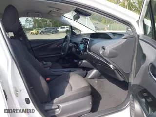 2022 Toyota Prius L Eco with VIN JTDKAMFU5N3181724, listed as a IAAI auction lot 41568635 with 67,360 mi miles. Bid and sale history available at carsss.com. Image 5.