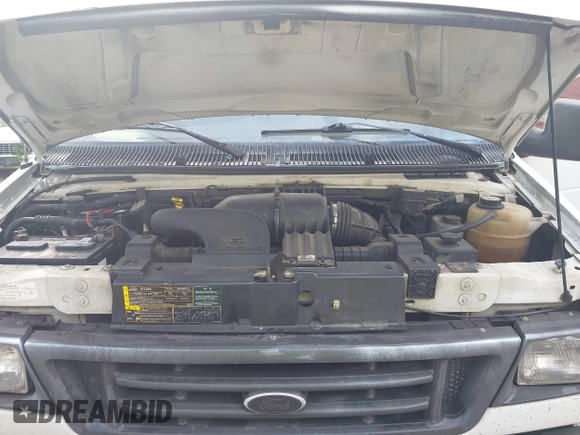 2005 Ford Econoline Cargo with VIN 1FTRE14W65HA89689, listed as a IAAI auction lot 42607059 with 260,935 mi miles and . Bid and sale history available at DreamBid. Image 10.