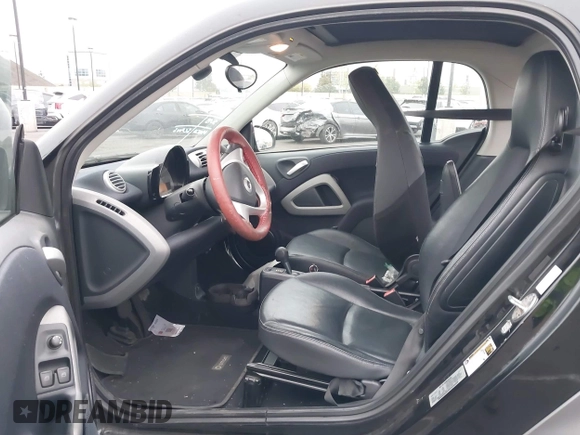 2015 Smart fortwo Passion with VIN WMEEJ3BA1FK787744, listed as a IAAI auction lot 42095001 with 43,370 mi miles and . Bid and sale history available at DreamBid. Image 5.