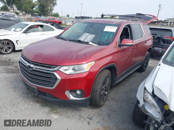 2021 Chevrolet Traverse LT Cloth with VIN 1GNERGKW5MJ113147, listed as a IAAI auction lot 42510509 with 70,214 mi miles and . Bid and sale history available at DreamBid. Image 2.