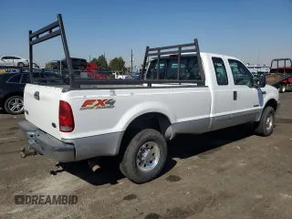 2003 Ford Super Duty F-250 XL with VIN 1FTNX21F73EA48988, listed as a Copart auction lot 74278654 with 174,738 mi miles and Salvage Title. Bid and sale history available at carsss.com. Image 3.
