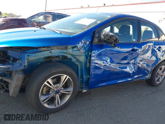 2018 Ford Focus SE z VIN 1FADP3FE4JL279265, wystawiony jako IAAI lot #42068130 z przebiegiem 43 616 mil mil oraz . Historia ofert i sprzedaży dostępna na DreamBid. Obrazek 20.