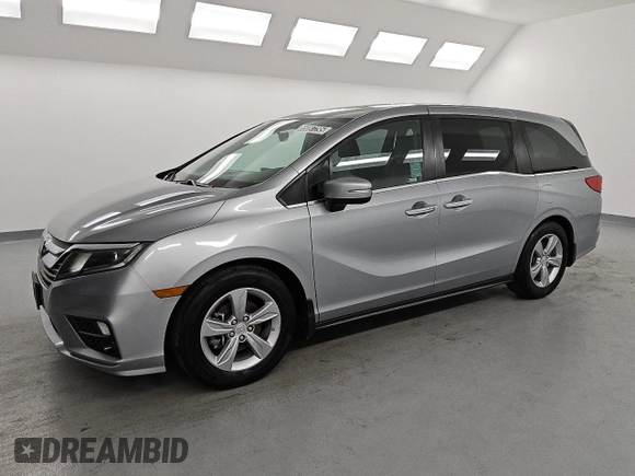 2018 Honda Odyssey EX-L с VIN 5FNRL6H78JB079617, выставлен на аукционе Copart как лот 55087295 с пробегом 185 534 миль миль и Чистый • Clean title. История ставок и продаж доступна на DreamBid. Изображение 1.