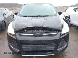 2015 Ford Escape SE with VIN 1FMCU9G95FUA27587, listed as a IAAI auction lot 41715978 with 114,482 mi miles. Bid and sale history available at carsss.com. Image 6.