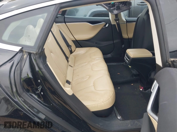 2014 Tesla Model S 60 with VIN 5YJSA1H10EFP34137, listed as a IAAI auction lot 42311565 with Not provided miles and . Bid and sale history available at DreamBid. Image 8.