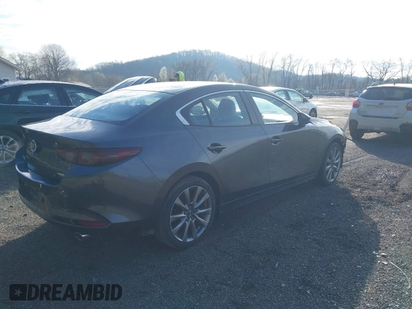 2019 Mazda 3 Select with VIN JM1BPACL1K1109354, listed as a IAAI auction lot 41863243 with 58,520 mi miles and . Bid and sale history available at DreamBid. Image 4.