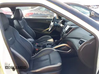 2015 Hyundai Veloster Turbo with VIN KMHTC6AE4FU234611, listed as a IAAI auction lot 42059915 with 107,388 mi miles. Bid and sale history available at carsss.com. Image 5.