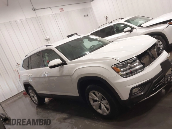 2018 Volkswagen Atlas SE with VIN 1V2KR2CA7JC574270, listed as a IAAI auction lot 41654110 with 104,440 mi miles and . Bid and sale history available at DreamBid. Image 14.