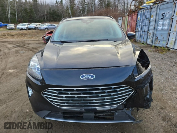 2021 Ford Escape Titanium Hybrid с VIN 1FMCU9DZ1MUA60443, выставлен на аукционе Copart как лот 80559254 с пробегом 30 968 миль миль и Списание • Salvage title. История ставок и продаж доступна на DreamBid. Изображение 5.