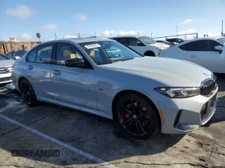 2023 BMW 3 Series 330e with VIN 3MW39FF07P8D26890, listed as a Copart auction lot 45203065 with 21,679 mi miles and Salvage Title. Bid and sale history available at carsss.com. Image 4.
