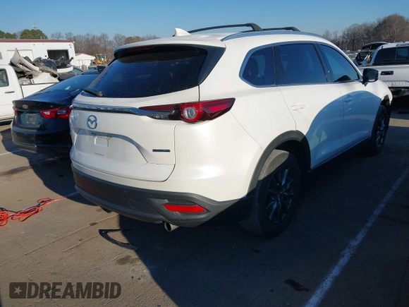 2021 Mazda CX-9 Touring with VIN JM3TCACY4M0522302, listed as a IAAI auction lot 41323543 with 35,223 mi miles and . Bid and sale history available at DreamBid. Image 4.