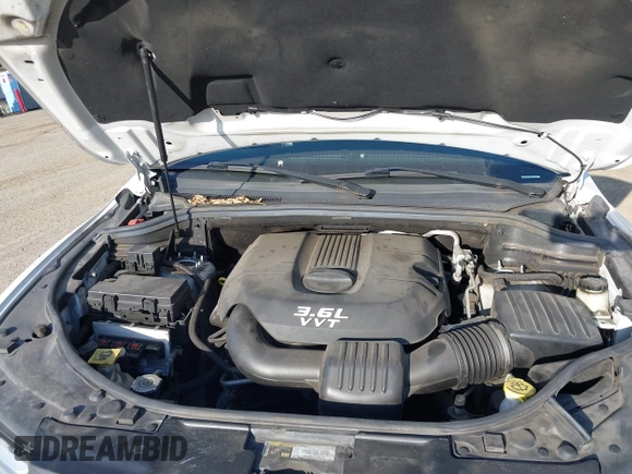 2013 Dodge Durango Crew with VIN 1C4RDJDG3DC664855, listed as a IAAI auction lot 42109159 with 148,440 mi miles and . Bid and sale history available at DreamBid. Image 10.