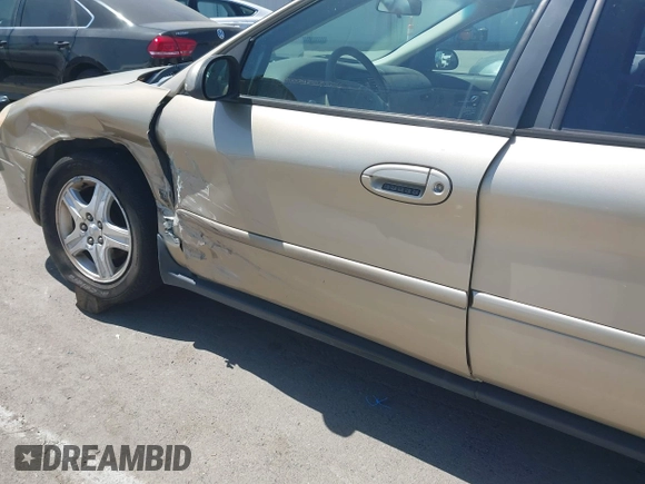 2000 Ford Taurus SEL with VIN 1FAFP56S3YA211717, listed as a IAAI auction lot 42249737 with 267,754 mi miles and . Bid and sale history available at DreamBid. Image 14.