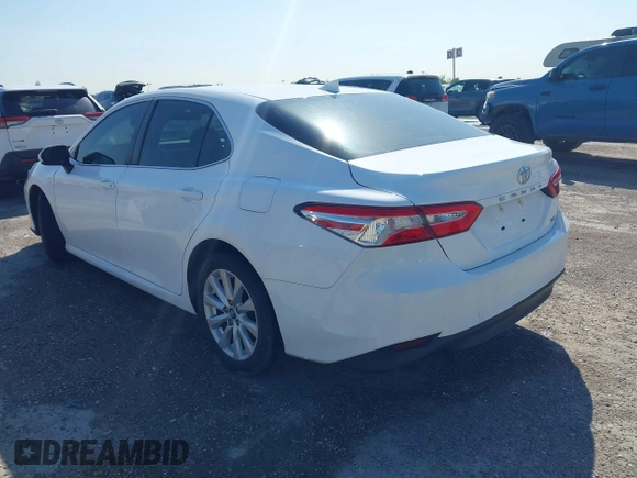 2019 Toyota Camry LE with VIN 4T1B11HK9KU825107, listed as a IAAI auction lot 41971159 with 15,802 mi miles and . Bid and sale history available at DreamBid. Image 3.