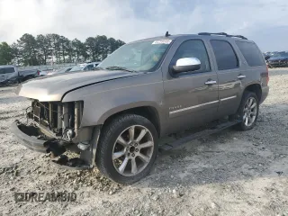 2012 Chevrolet Tahoe LTZ z VIN 1GNSCCE0XCR110507, wystawiony jako Copart lot #54269535 z przebiegiem 193 499 mil mil oraz Szkoda całkowita • Salvage title. Historia ofert i sprzedaży dostępna na DreamBid. Obrazek 1.