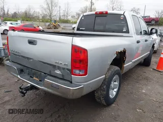 2002 Dodge 1500 z VIN 3D7HU18Z72G142477, wystawiony jako IAAI lot #42020799 z przebiegiem 208 996 mil mil oraz . Historia ofert i sprzedaży dostępna na DreamBid. Obrazek 4.