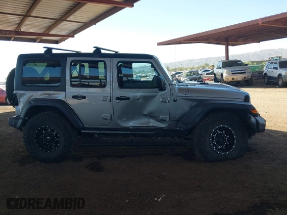 2019 Jeep Wrangler Unlimited Sport S z VIN 1C4HJXDG7KW557682, wystawiony jako IAAI lot #42586742 z przebiegiem 49 741 mil mil oraz . Historia ofert i sprzedaży dostępna na DreamBid. Obrazek 12.