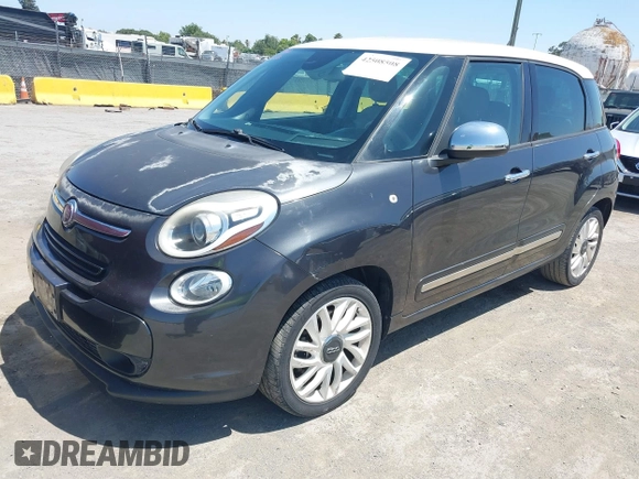 2014 FIAT 500L Lounge with VIN ZFBCFACH9EZ005710, listed as a IAAI auction lot 42508508 with 96,652 mi miles and . Bid and sale history available at DreamBid. Image 2.