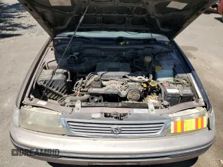 1993 Subaru Legacy L with VIN 4S3BJ6339P6948161, listed as a Copart auction lot 63123584 with 329,619 mi miles and Salvage Title. Bid and sale history available at DreamBid. Image 13.